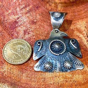 Chimney Butte Sterling Thunderbird pendant.